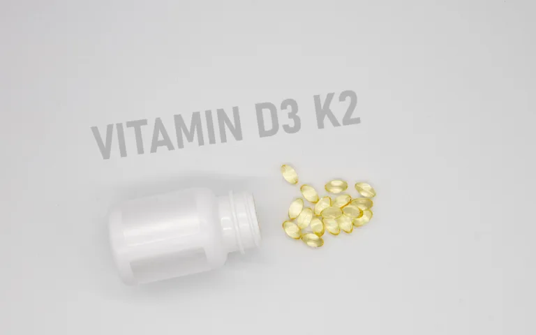 Bottle of vitamin D3 K2, designed to support bone health and immune system, recommended for daily use