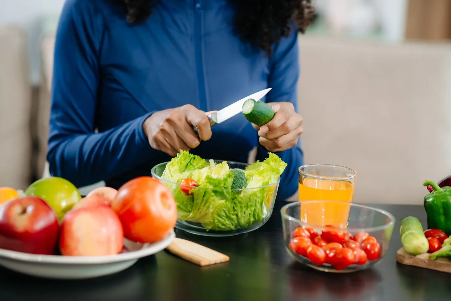 Preparing fresh fruits and vegetables as part of a lung cleanse diet plan that supports easy breathing and overall respiratory wellness