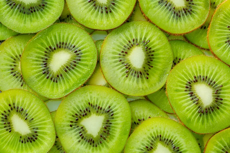 Close up of fresh kiwi slices rich in fiber and antioxidants supporting digestion and sustained energy in spring