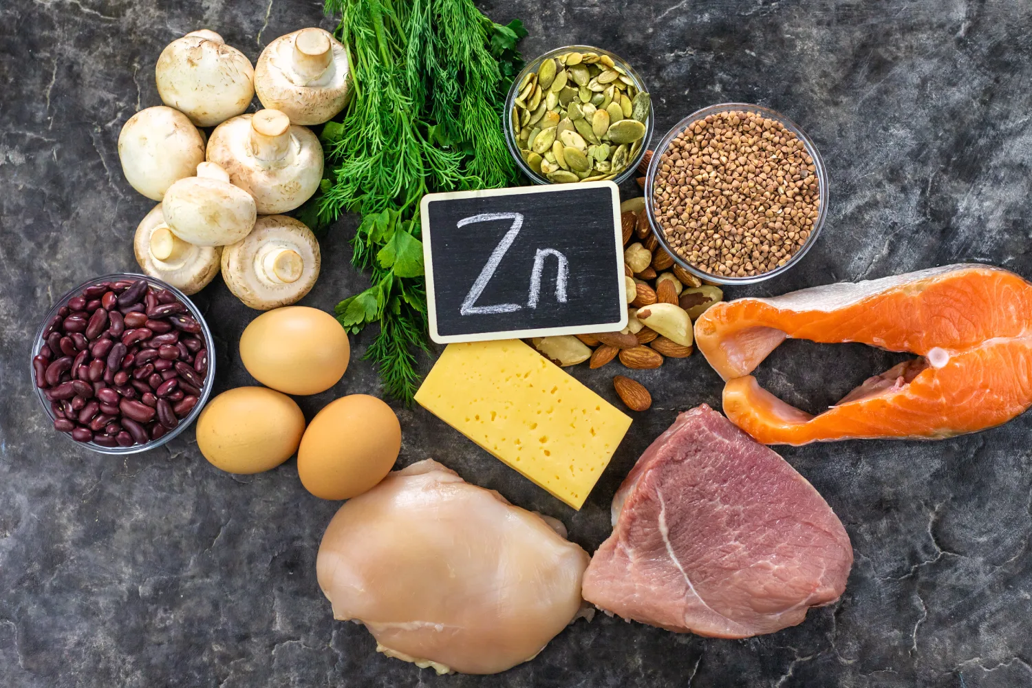 Zinc-rich foods including salmon, eggs, beans, seeds, mushrooms, meat, and cheese that may help support better sleep quality naturally